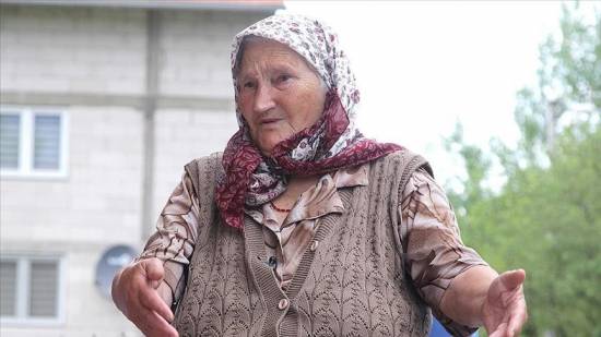 Mother in Srebrenica mourns for her family members lost through genocide