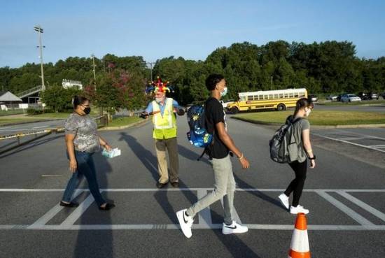 Chaos reigns in some schools with in-person learning. Many kids are learning at home.