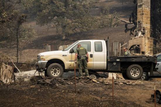 Wind-whipped fire leaves Northern California hamlet in ashes