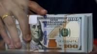 Dollar slips as China rekindles growth hopes